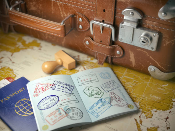 An image showing an international passport with visa stamps showing international travel
